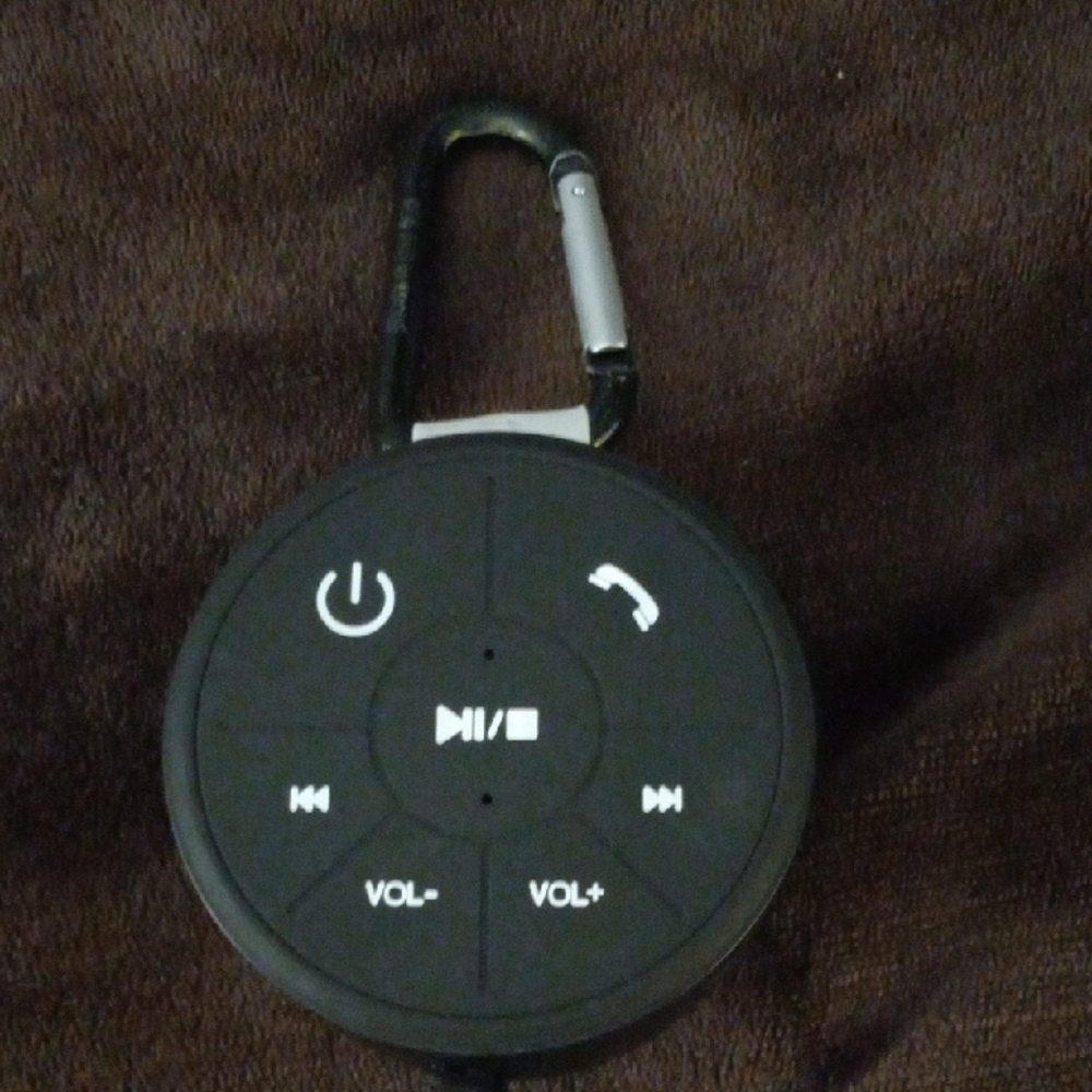 Compact Black Portable Speaker with Suction Cup And Clip.